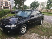 Cần bán xe Mazda 626 năm sản xuất 2002, màu đen, xe nhập