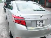 Bán Toyota Vios năm 2015, màu bạc số sàn 