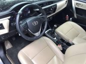 Cần bán gấp Toyota Corolla altis sản xuất 2016, màu bạc