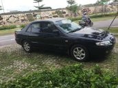 Cần bán xe Mazda 626 năm sản xuất 2002, màu đen, xe nhập