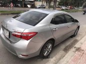 Cần bán gấp Toyota Corolla altis sản xuất 2016, màu bạc