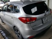 Bán Kia Rondo GAT 2.0AT màu bạc, số tự động, sản xuất 2015, biển Sài Gòn, lăn bánh 56000km