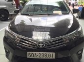 Cần bán xe Toyota Corolla 1.8G đời 2015, màu đen như mới  