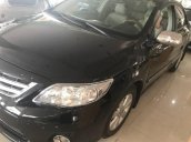 Cần bán gấp Toyota Corolla altis đời 2009, màu đen như mới