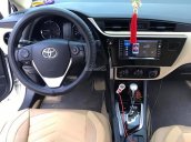 Bán xe Toyota Corolla altis 1.8E AT đời 2017, màu trắng còn mới