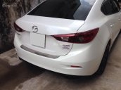 Cần bán xe Mazda 3 sedan đời 2016 số tự động màu trắng, chạy lướt 19.000km