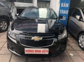 Bán xe Chevrolet Cruze màu đen, xe mua từ mới đi rất ít