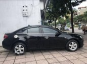 Bán xe Chevrolet Cruze màu đen, xe mua từ mới đi rất ít