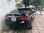 Bán xe Chevrolet Cruze màu đen, xe mua từ mới đi rất ít