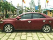 Cần bán lại xe Kia Forte AT đời 2011, màu đỏ, xe nhà đi nên giữ rất kĩ