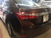 Cần bán lại xe Toyota Corolla altis 1.8 AT sản xuất 2015, màu nâu còn mới 