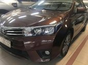 Cần bán lại xe Toyota Corolla altis 1.8 AT sản xuất 2015, màu nâu còn mới 