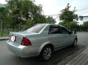 Bán Ford Laser GHIA 1.8 AT sản xuất năm 2004, màu bạc xe gia đình