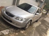 Bán xe Mazda 323 năm sản xuất 2002, màu bạc chính chủ