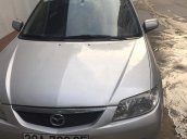 Bán xe Mazda 323 năm sản xuất 2002, màu bạc chính chủ