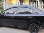 Cần bán lại xe Daewoo Gentra SX 1.5 MT sản xuất 2011, màu đen còn mới, giá 178tr
