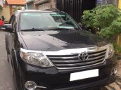 Cần tiền bán Fortuner 2015, số tự động, hai cầu, màu đen, ít sử dụng