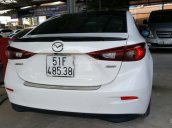 Bán Mazda 3 FaceLift 1.5AT màu trắng camay số tự động bản sedan sản xuất 2017 biển Sài Gòn lăn bánh 22.000 km