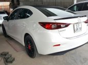 Bán Mazda 3 FaceLift 1.5AT màu trắng camay số tự động bản sedan sản xuất 2017 biển Sài Gòn lăn bánh 22.000 km
