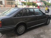 Cần bán gấp Mazda 626 năm 1995, màu xám, giá 87tr