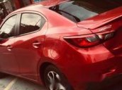 Bán ô tô Mazda 2 năm sản xuất 2016, màu đỏ