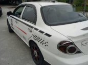 Cần bán Kia Spectra năm 2004, màu trắng, xe đẹp, chạy êm ổn định