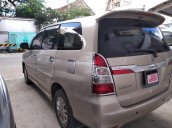 Bán xe Toyota Innova V, tự động, màu nâu vàng 2014