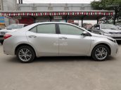 Cần bán Toyota Corolla 1.8G đời 2016, màu bạc