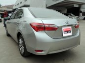 Cần bán Toyota Corolla 1.8G đời 2016, màu bạc