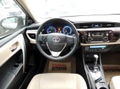 Cần bán Toyota Corolla 1.8G đời 2016, màu bạc