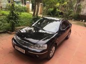 Bán ô tô Ford Laser sản xuất năm 2003, màu đen, nhập khẩu