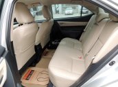 Cần bán Toyota Corolla 1.8G đời 2016, màu bạc