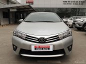 Cần bán Toyota Corolla 1.8G đời 2016, màu bạc