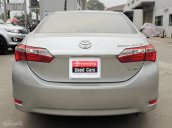 Cần bán Toyota Corolla 1.8G đời 2016, màu bạc