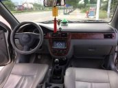 Cần bán lại xe Daewoo Lacetti sản xuất 2009, màu bạc