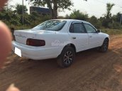 Đổi xe cần bán Camry 1993, số sàn, màu trắng, zin như cục bin