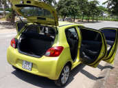 Bán nhanh Mitsubishi Mirage 1.2AT 2015 màu vàng chanh, nhập khẩu nguyên chiếc