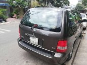 Cần bán xe Kia Carnival sản xuất 2009, màu nâu, giá 325 triệu