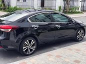 Cần bán xe Kia Cerato 1.6 MT sản xuất 2017, màu đen chính chủ