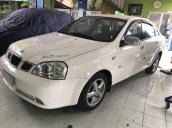 Bán Daewoo Lacetti MT đời 2004, màu trắng, máy 1.8 chạy ngon