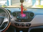 Cần bán lại xe Hyundai Grand i10 sản xuất 2014, màu trắng, biển số Bình Dương