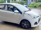 Cần bán lại xe Hyundai Grand i10 sản xuất 2014, màu trắng, biển số Bình Dương