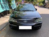 Cần bán Ford Laser GHIA 1.8 AT sản xuất năm 2003, màu đen chính chủ, giá chỉ 205 triệu