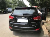 Cần bán xe Hyundai Tucson 2.0 AT 4WD sản xuất năm 2010, màu đen, nhập khẩu nguyên chiếc, 536 triệu