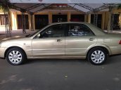 Bán Ford Laser GHIA 1.8 AT 2005, màu vàng cát