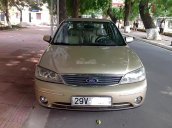 Bán Ford Laser GHIA 1.8 AT 2005, màu vàng cát