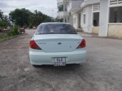 Cần bán gấp Kia Spectra MT năm 2004, màu trắng còn mới, giá 125tr