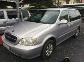 Cần bán lại xe Kia Carnival đời 2007, màu bạc số sàn