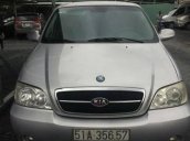 Cần bán lại xe Kia Carnival đời 2007, màu bạc số sàn