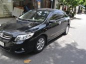 Cần bán Toyota Corolla altis 1.8 AT đời 2009, màu đen như mới 